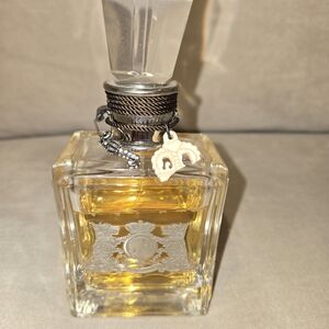 Juicy Couture Eau de Parfum 3.4 Oz Bottle with Gold Hue